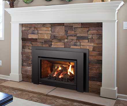 Regency U31 Gas Fireplace Insert with large viewing area and brown stone surround with white mantle